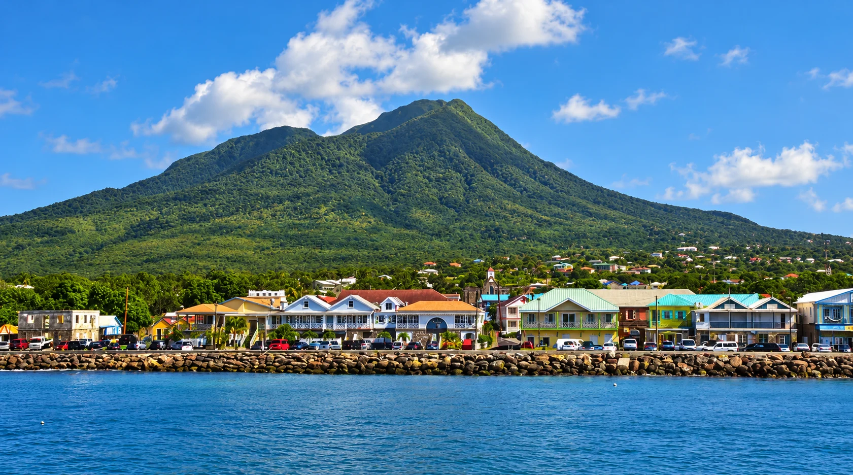 Charlestown waterfront beneath the green slopes of Nevis Peak